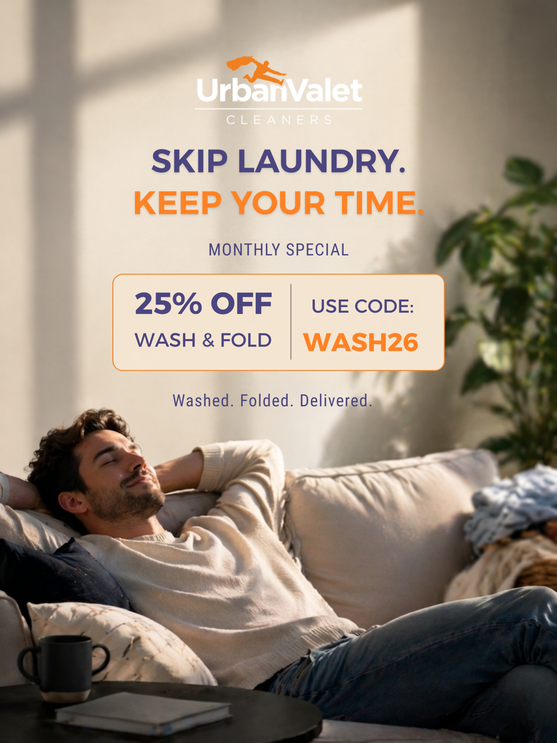 A man relaxes on a sofa in a sunlit room. Text promotes Urban Valet Cleaners: 25% off wash & fold with code WASH26, monthly special, “Washed. Folded. Delivered.”.