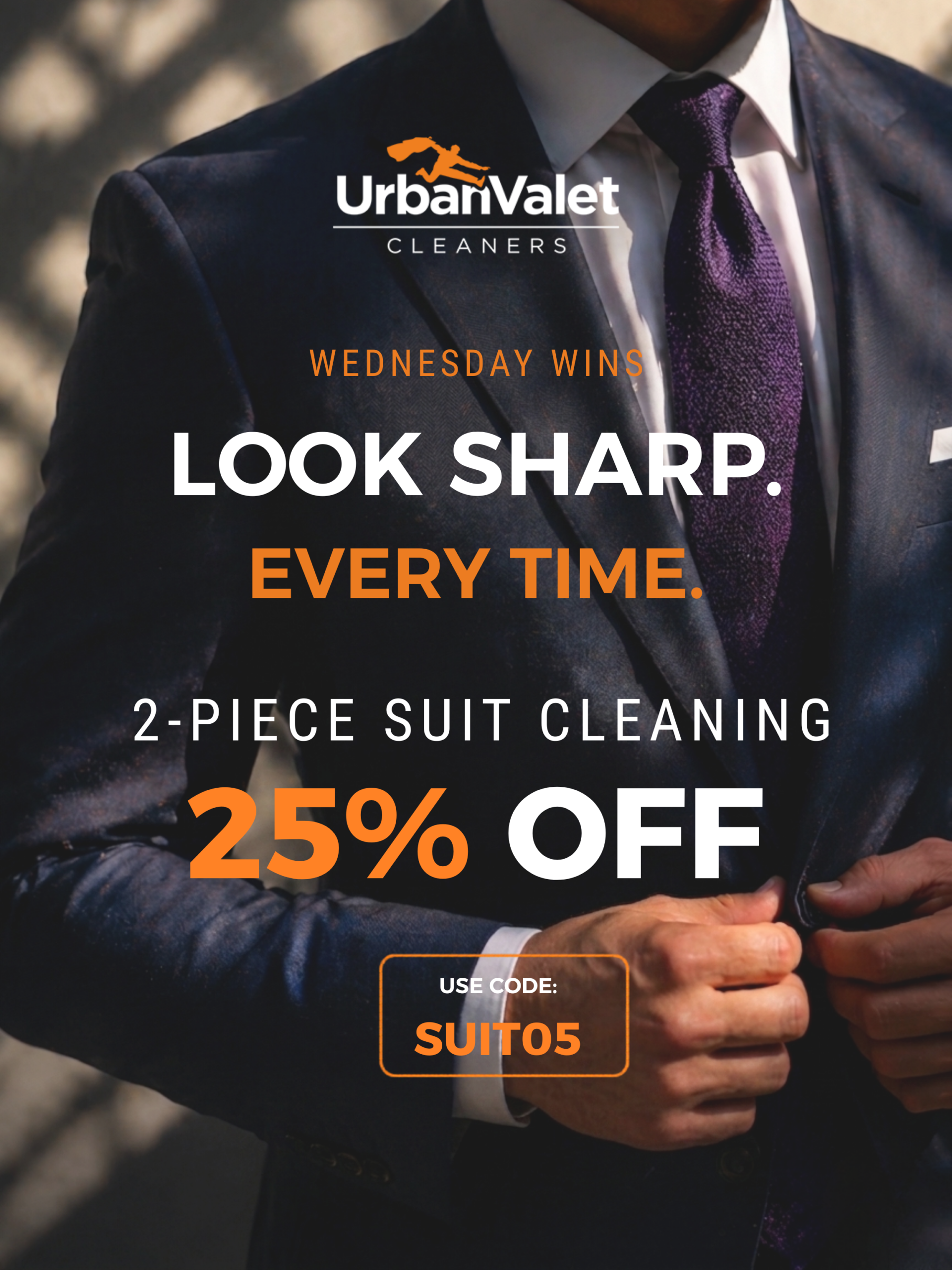 A man in a suit adjusts his jacket. Text advertises Urban Valet Cleaners’ 25% off 2-piece suit cleaning with code SUIT05. A man in a suit adjusts his jacket. Text advertises Urban Valet Cleaners’ 25% off 2-piece suit cleaning with code SUIT05.